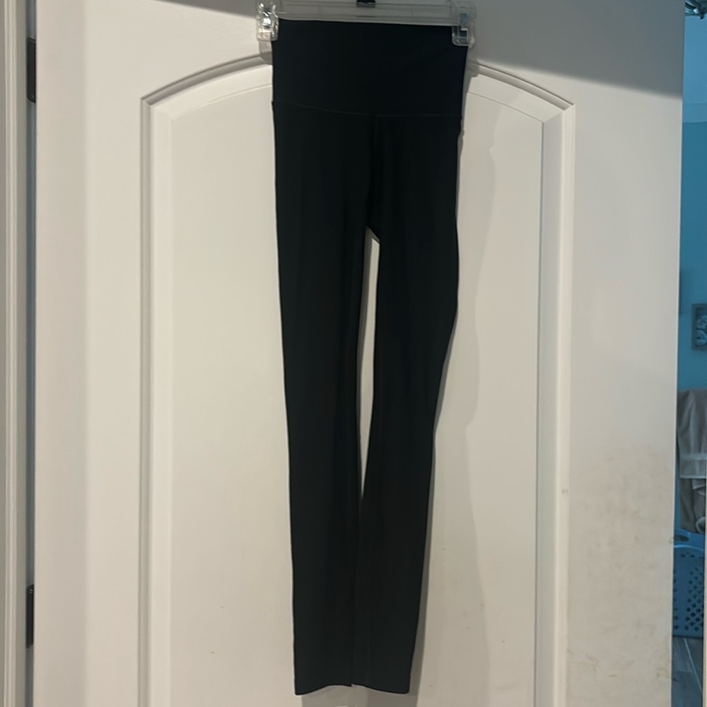 Lululemon Black leggings. Back pocket. Look like new. Size 2.